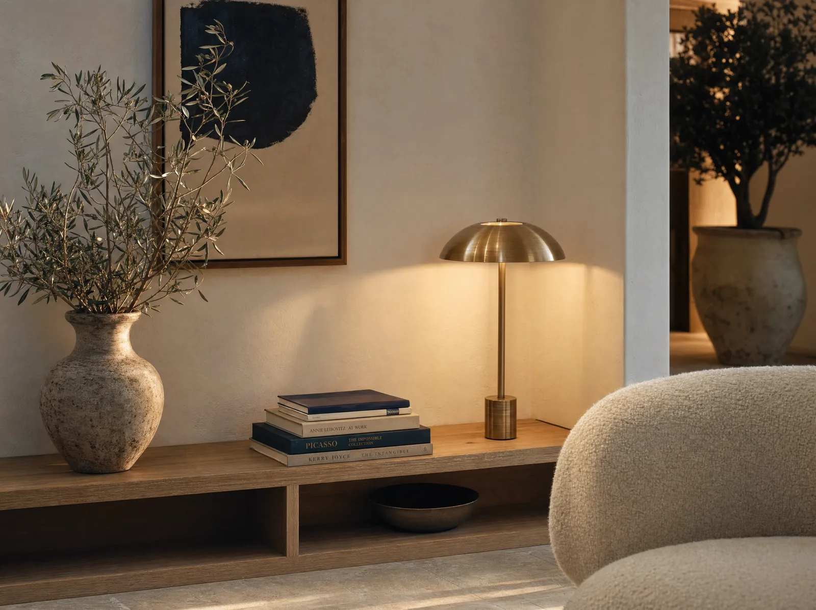 A warm reading corner of the lounge at dusk